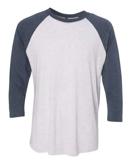 Next Level Unisex Triblend Three-Quarter Raglan T-Shirt in Indigo Sleeves/ Heather White Body